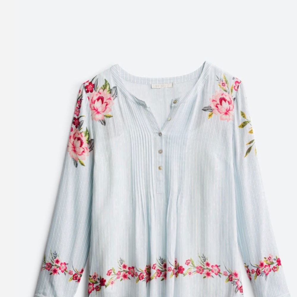 Tunic top with pleat detail and camisole.